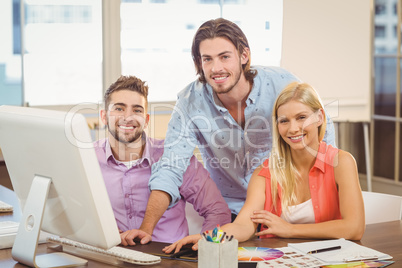 Business people using computer