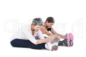 Women sitting and exercising