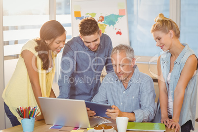 Business people using technologies in meeting room