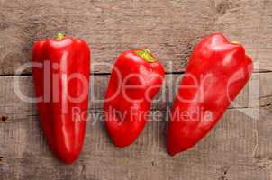 Three red paprika