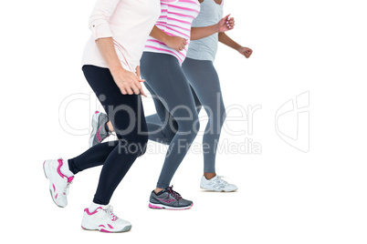 Low section of women jogging
