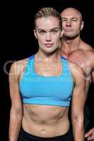 Portrait of muscular woman and man