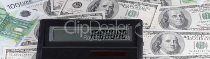 dollar, euro banknote and calculator