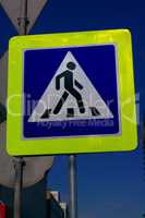 pedestrian crossing sign on street