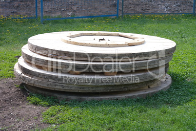 wood ring on grass in park