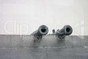 antique cannon on wall