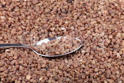 buckwheat background and teaspoon