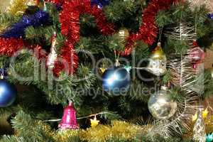 many of toys on green christmas fir