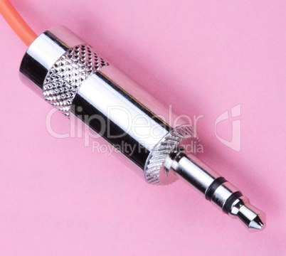 Stereo Male Plug Connector on Pink Background