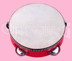 tambourine isolated on pink