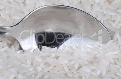 rice background and teaspoon