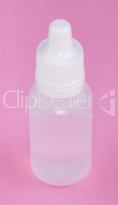 White Plastic Vial on Pink Background