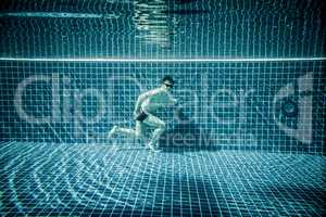 Man runs underwater swimming pool