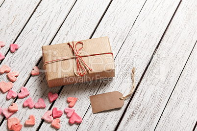 Vintage gift box with blank gift tag and hearts