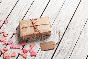 Vintage gift box with blank gift tag and hearts