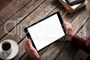 Tablet computer with isolated screen in male hands
