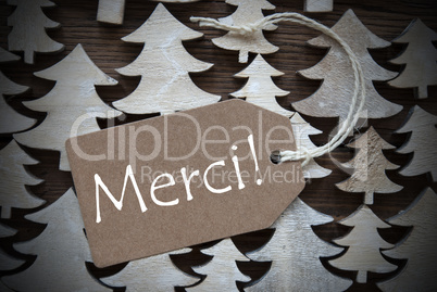 Brown Christmas Label With Merci Means Thank You