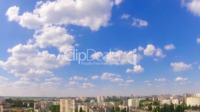 White Clouds over the City. Time Lapse