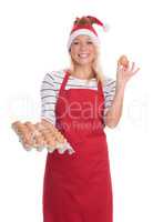 Weihnachtsfrau hält eine Palette mit Eier
