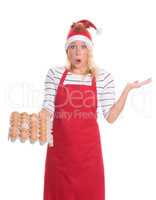 Weihnachtsfrau hält eine Palette mit Eier
