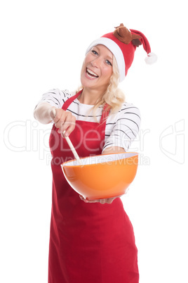 Weihnachtsfrau rührt mit Kochlöffel in einer Schale
