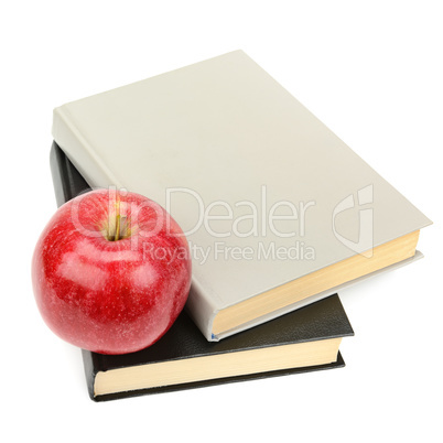 books and apple isolated on white background