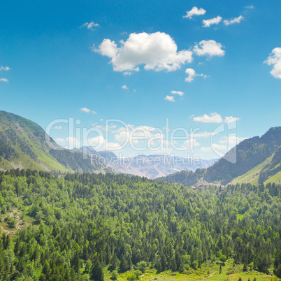 scenic mountains, meadows and blue sky