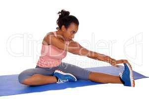 Beautiful african american woman stretching.