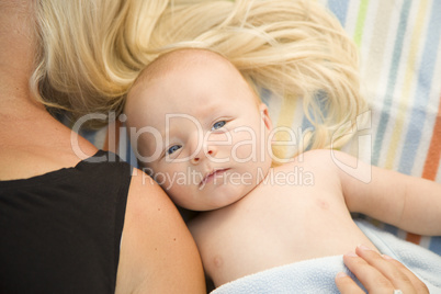 Cute Baby Boy Laying Next to His Mommy on Blanket
