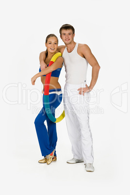 Young Woman And Man With Training Device