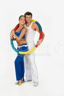 Young Woman And Man With Training Device