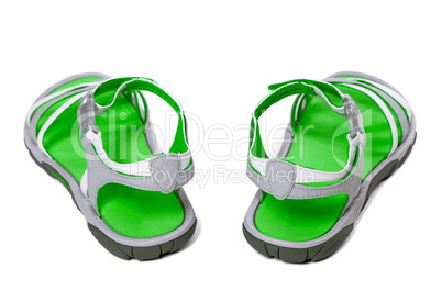 Green summer sandals on white background