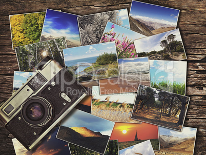 old vintage camera and photos on a wooden background