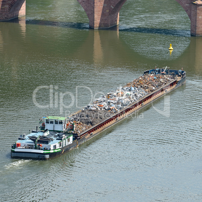 Barge transports waste on the river