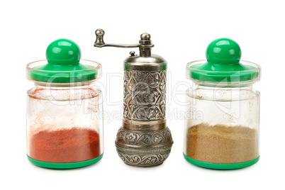 spices in jars and mill