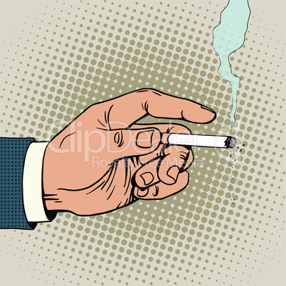 Hand with a smoking cigarette