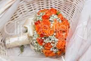 Wedding bouquet in wicker basket