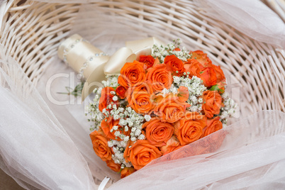 Wedding bouquet in wicker basket