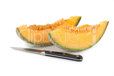 Cantaloupe melon slices with kitchen knife