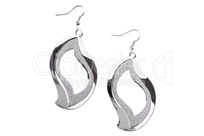 Pair of silver earrings isolated on white background