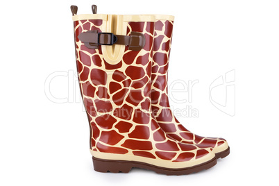 Gumboots with giraffe pattern isolated on white