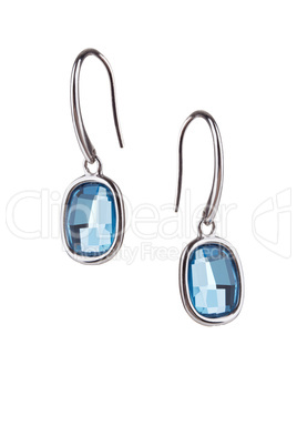 Pair of sapphire earrings isolated on white background
