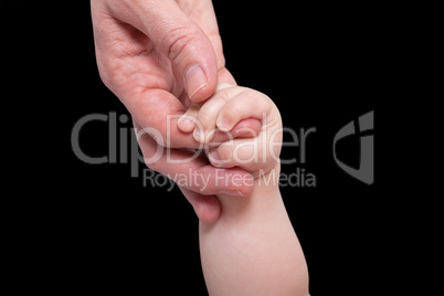 Mommy holding baby's hand