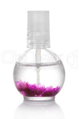 Nail and cuticle oil isolated on white background with flowers i