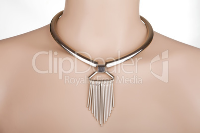 Silver statement necklace on a mannequin