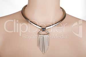 Silver statement necklace on a mannequin