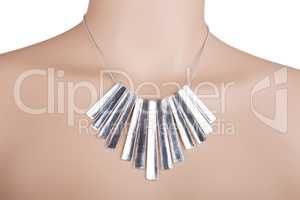 Silver statement necklace on a mannequin