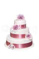 Wedding cake with roses isolated on white