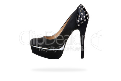 Black platform shoe with studs, isolated on white