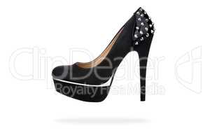 Black platform shoe with studs, isolated on white
